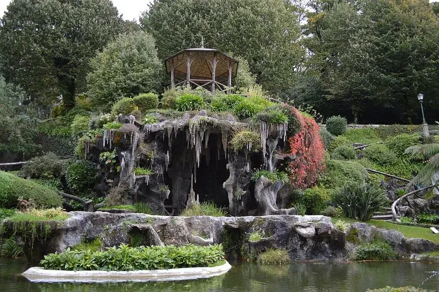 The grotto and lake in the wooded park behind the church